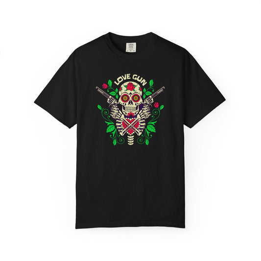 Black Love Gun t-shirt with sugar skull, glowing eyes, floral accents, and crossed pistols graphic design